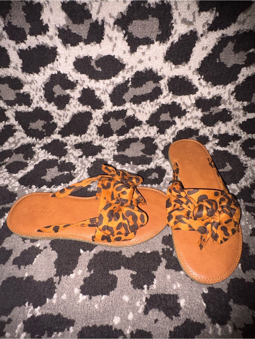 Leopard bow sandals.
